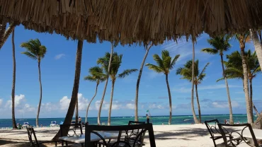 Featured image showing a beautiful beach scene in Punta Cana, representing the typical weather conditions in August.